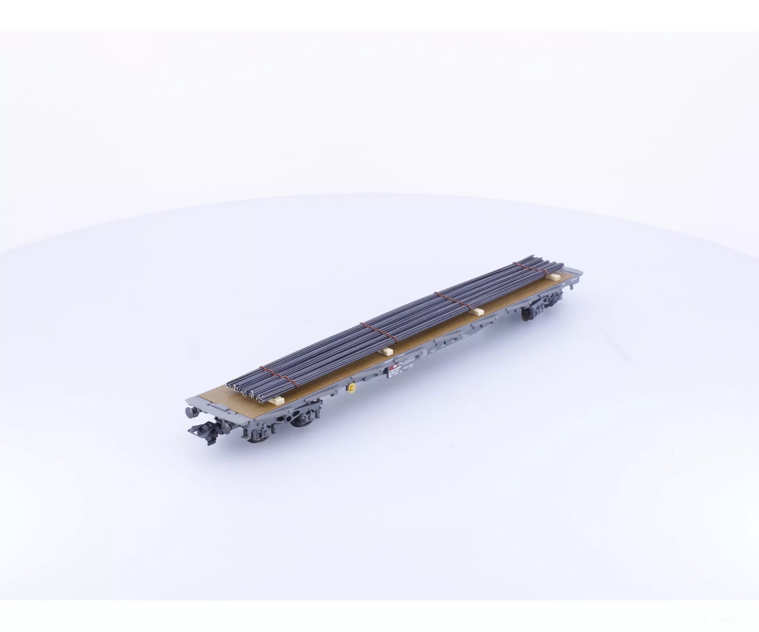 HAG 353 HO SBB-CFF-FFS Flat Car with Round Steel Load 169-0 (2nd Hand)