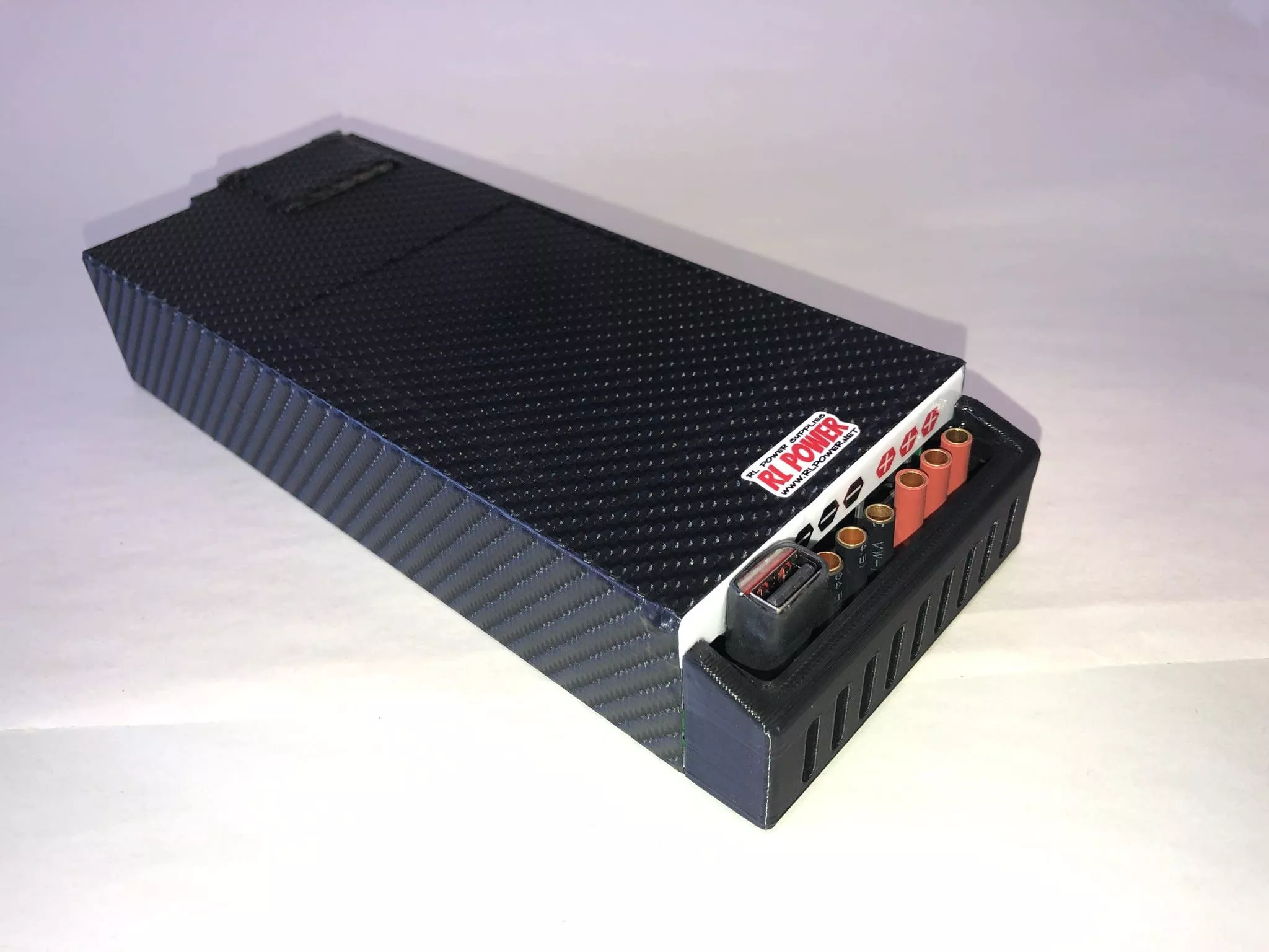 MRC75USBRLPower Carbon Wrapped Icharger 12V 75 Amp power supply with USB (RLPower)